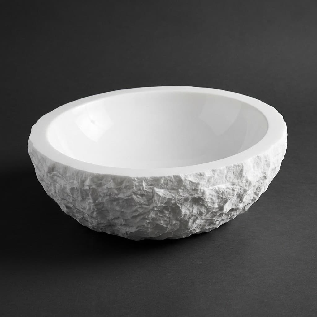Exquisite Hand-Carved Oval Stone Vessel Sink with Chiseled Exterior - hero-light